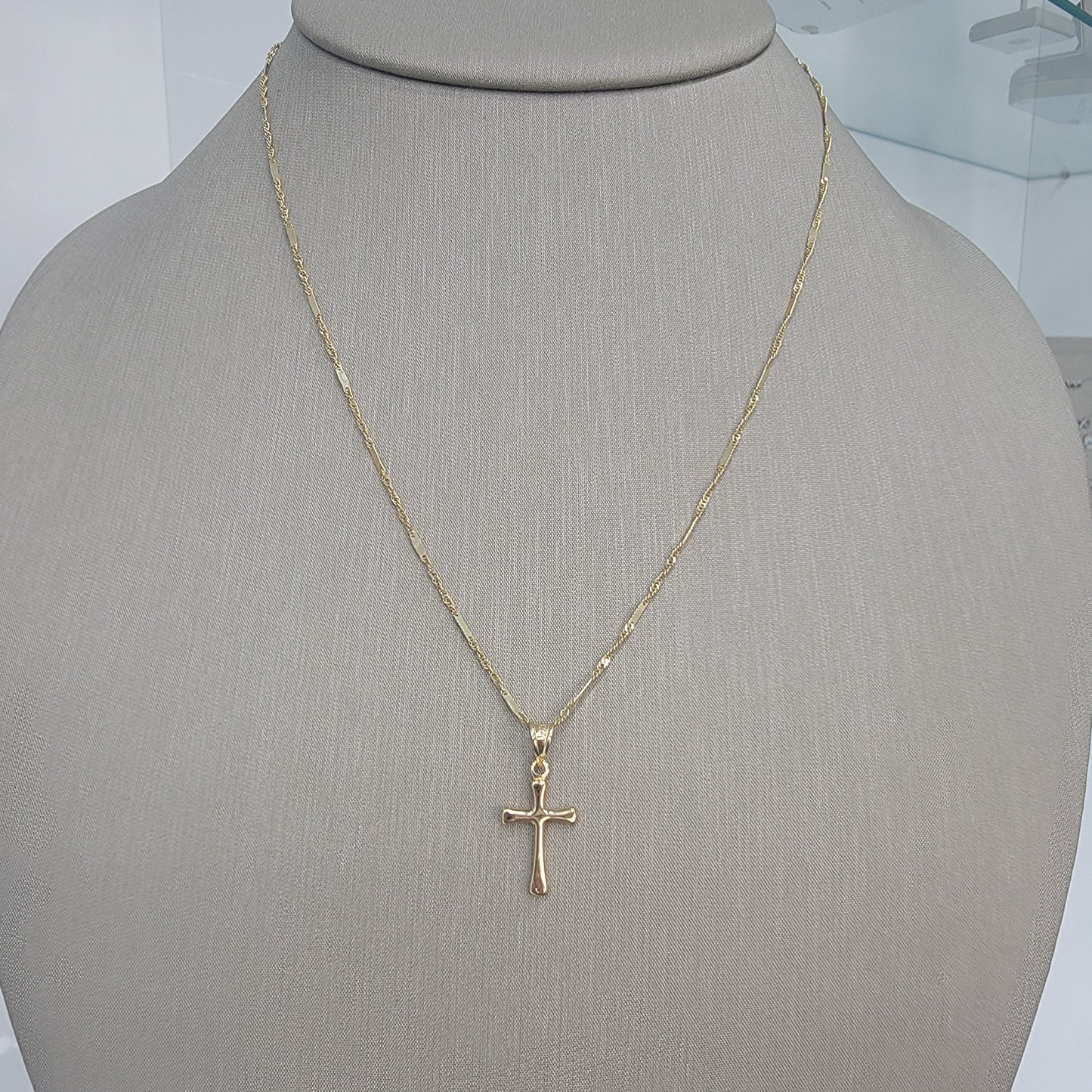 Cadena y crucifijo.